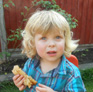 Little Darlings Nursery enjoying a snack in the garden